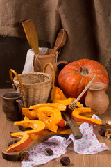 Fototapeta na wymiar Pumpkin cooking on the kitchen table. Vintage style