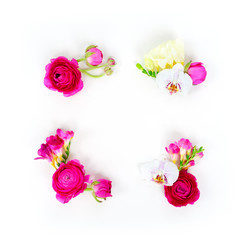 Flowers composition. Frame made of ranunculus and orchidea flowers on white background. Flat lay scene with copy space © neirfy