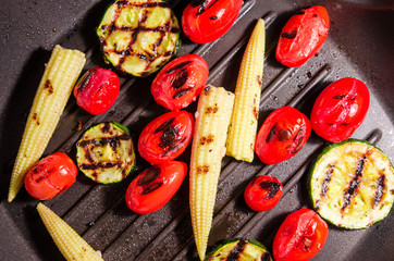 Food background of vegetables on the grill