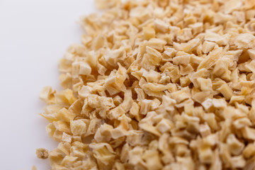 fragrant dried parsnip on a white acrylic background