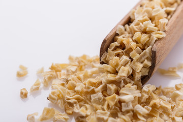 fragrant dried parsnip on a white acrylic background