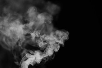 White smoke on a black background. Texture of smoke. Clubs of wh