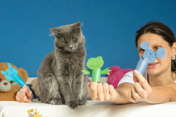 Cat tired of playing in the puppet theater