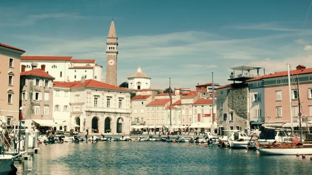 Piran, Slovenia. Summer a view of the city of piran with beautiful old buildings and central square. Marina with yachts near the beautiful old city in Europe.