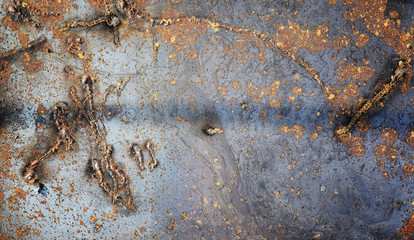 The texture is metallic. Industrial background from an old rusty