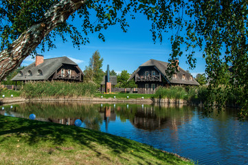 Old wooden houses with reed roofs