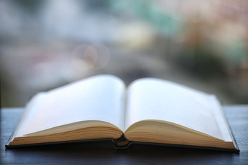 open book and a table