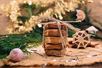 Cookies baked in the shape of an asterisk, stacked, tied with a thick thread, Christmas delicious...