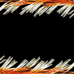 Bunch of fiber optic cables and connectors on black background with copyspace, technology
