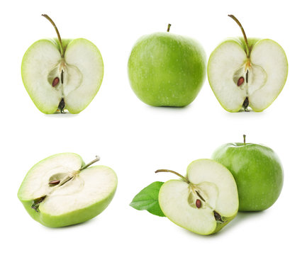 Set with delicious cut green apples on white background