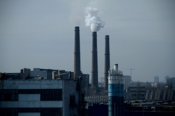 Toxic smoke emitted from industrial plant smokestacks 