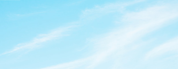 Fototapeta premium Panoramic Blue sky background with soft white clouds