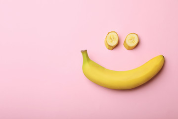 Funny flat lay composition with bananas on color background. Space for text