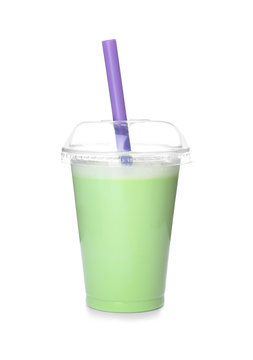 Plastic cup with tasty milk shake on white background