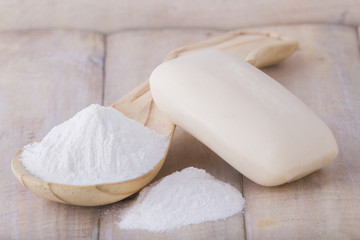 baking soda and toilet soap on the table