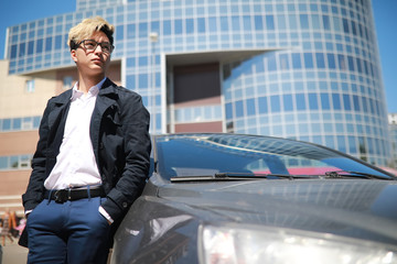 Man with car in the street