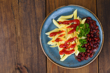 Pasta and beans in tomato sauce