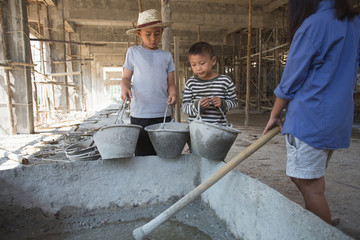 Image blur, Poor children are forced to work construction, Violence children and trafficking...