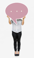 Woman holding a speech bubble symbol
