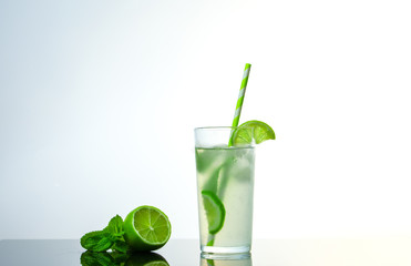 cocktail with ice slices of lime and mint