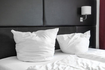 white pillow on bed
