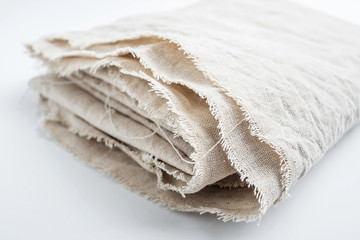 a piece of folded primary color burlap material background material