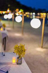 Abstract blur image of Outdoor Cafe or restaurant in night time with bokeh for background usage . (vintage tone)
