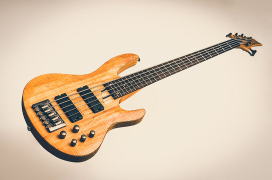 Electric bass guitar isolated on white