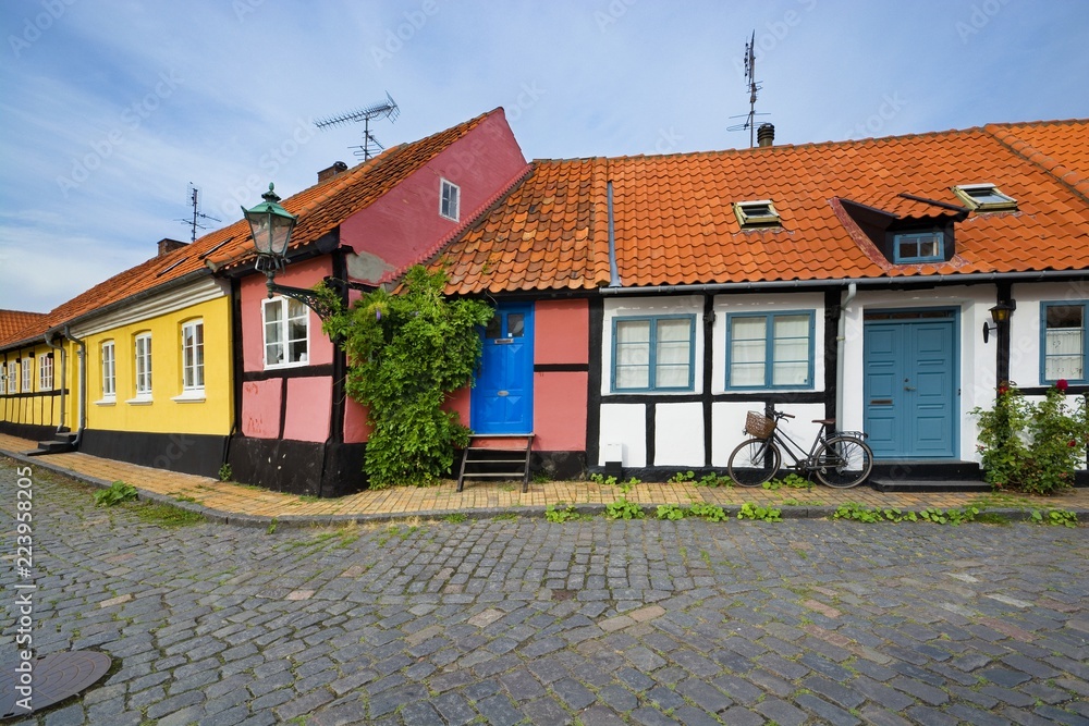 Wall mural traditional colorful half-timbered houses in ronne, bornholm, denmark