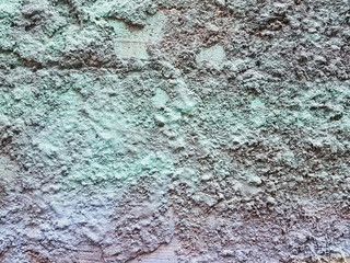 Abstract color painting on concrete block background (blue,green,yellow)  Smooth texture for design and decoration. Natural building material. Natural patterns on the stone. Plates for floor and walls