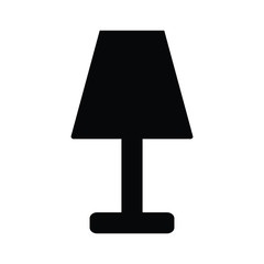 A black and white silhouette of a short lamp