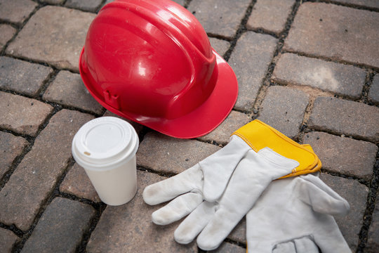 Red Helmet, Coffee Mug And Work Gloves