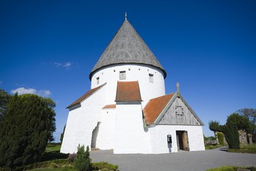 Defensive round church in Olsker, Bornholm, Denmark. It is one of four round churches on the Bornholm island. Built about 1150, 26 meter high, considered the most elegant round church