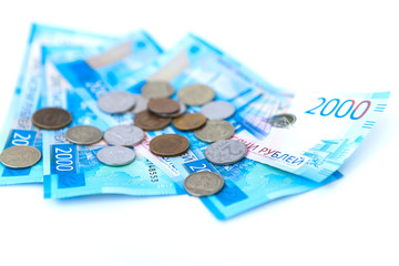 Russian money banknotes currency rouble on white isolated background. in nominal value of two thousand. Close up. Rich concept