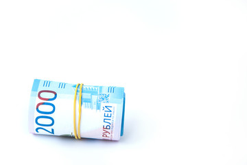 Russian money banknotes currency rouble on white isolated background. in nominal value of two thousand. Close up. Rich concept