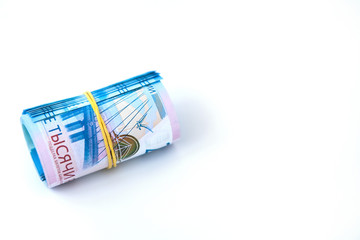 Russian money banknotes currency rouble on white isolated background. in nominal value of two thousand. Close up. Rich concept