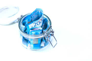 Paper Russian Money. New Russian Banknotes Of 2000 Two Thousands Rubles Close Up in glass jar on...
