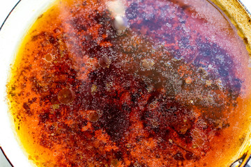 Stains of fat on the surface of water abstraction. Creative rough textured background