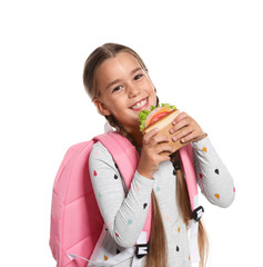Schoolgirl with healthy food and backpack on white background
