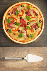 italian pizza at wooden table