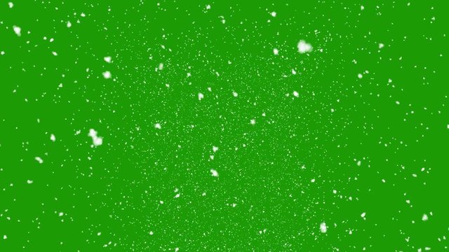 Isolated falling snow on green screen