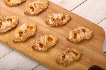 Puff pastry cake with apple in bakery