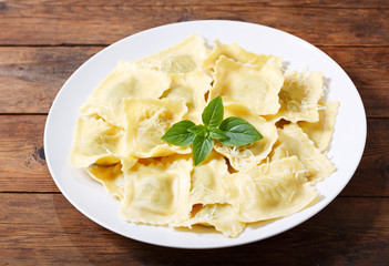 plate of ravioli with parmesan