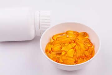 Fish oil capsules and container