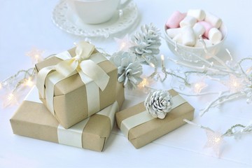 Gift boxes and white Christmas decorations.