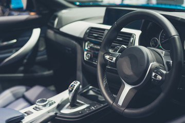 interior of a modern car with steering wheel tone Luxury