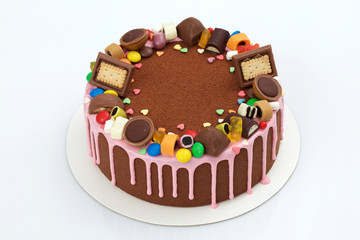 children's chocolate mousse cake on white background closeup view