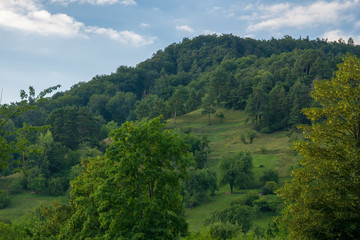 Hike trails through green mountain nature landscape