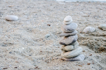 Fototapeta na wymiar The pebbles on the beach at Sea 