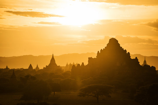 The sunset of Bagan, Myanmar is an ancient city with thousands of historic buddhist temples and stupas.